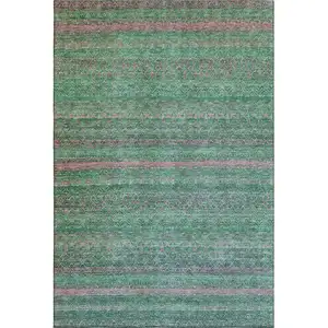 Photo of Green And Blush Striped Washable Area Rug With UV Protection