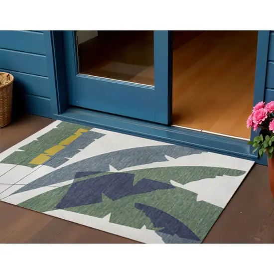 Green And Cream Abstract Indoor Outdoor Area Rug Photo 1