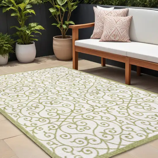 Green And Cream Geometric Indoor Outdoor Area Rug Photo 1