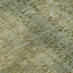 Photo of Green And Gold Abstract Washable Area Rug With UV Protection