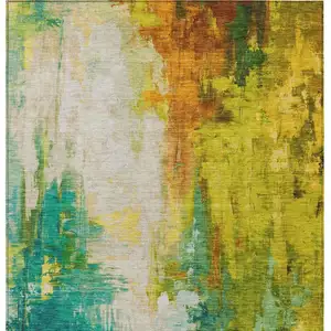 Photo of Green And Gold Abstract Washable Indoor Outdoor Area Rug
