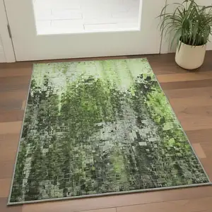 Photo of Green And Gray Abstract Washable Area Rug With UV Protection