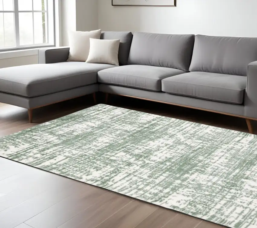 Green And Ivory Abstract Area Rug Photo 1