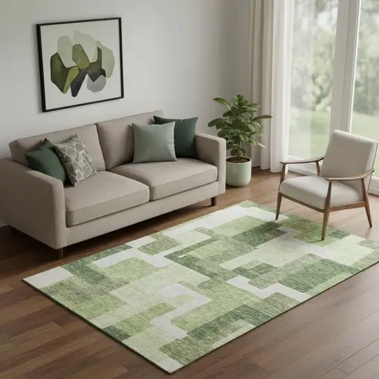Green And Ivory Abstract Geometric Washable Area Rug With UV Protection Photo 1