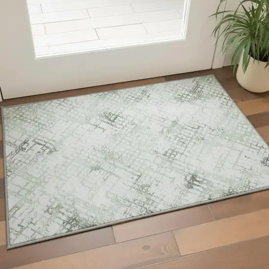 Green And Ivory Abstract Geometric Washable Area Rug With UV Protection Photo 2