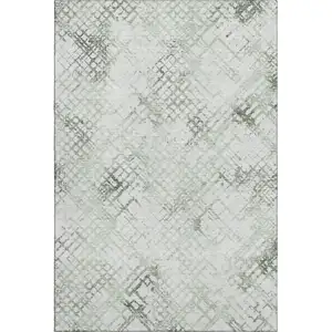 Photo of Green And Ivory Abstract Geometric Washable Area Rug With UV Protection