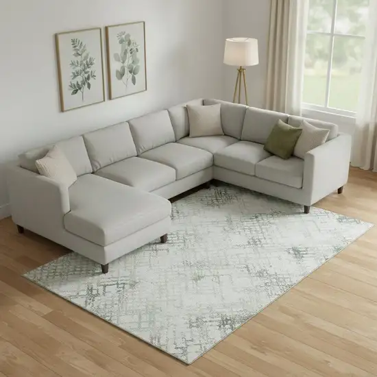 Green And Ivory Abstract Geometric Washable Area Rug With UV Protection Photo 1