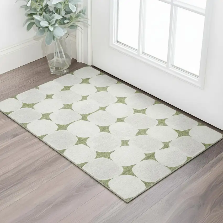 Green And Ivory Abstract Geometric Washable Area Rug With UV Protection Photo 1