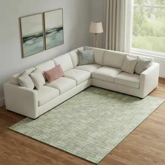 Green And Ivory Abstract Geometric Washable Area Rug With UV Protection Photo 1