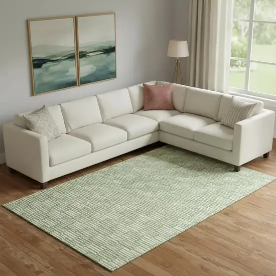 Green And Ivory Abstract Geometric Washable Area Rug With UV Protection Photo 1