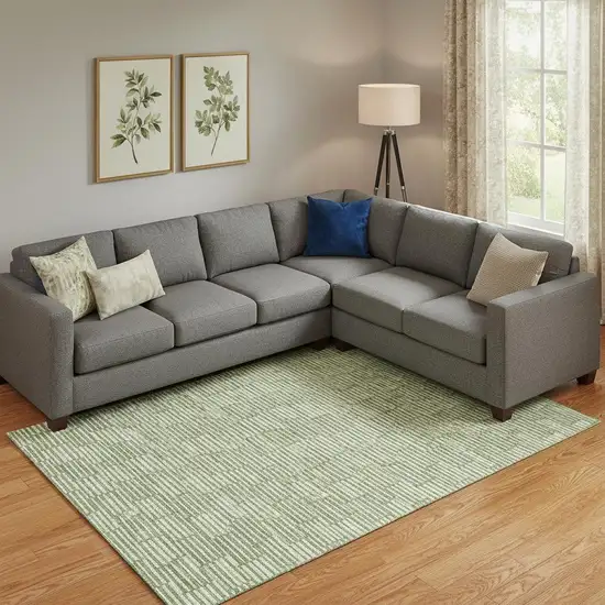 Green And Ivory Abstract Geometric Washable Area Rug With UV Protection Photo 1