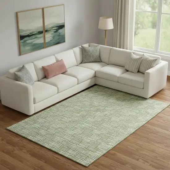 Green And Ivory Abstract Geometric Washable Area Rug With UV Protection Photo 1