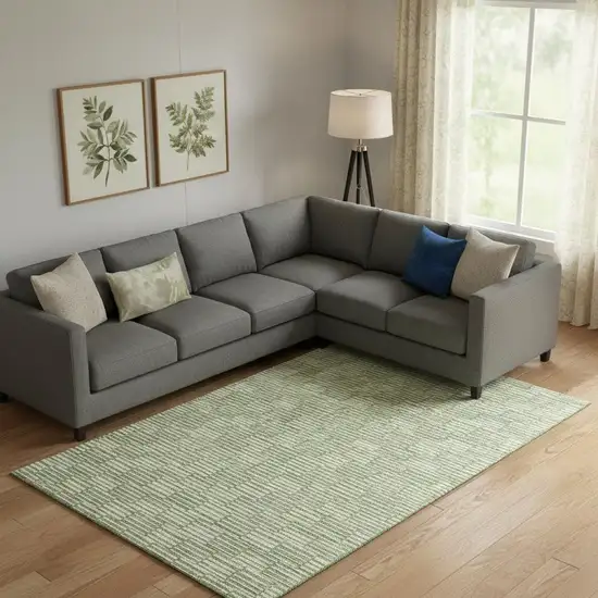 Green And Ivory Abstract Geometric Washable Area Rug With UV Protection Photo 1