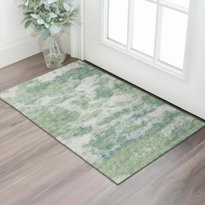 Green And Ivory Abstract Washable Area Rug With UV Protection Photo 1