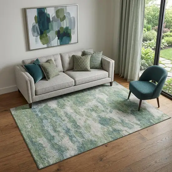 Green And Ivory Abstract Washable Area Rug With UV Protection Photo 1
