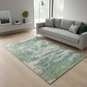 Photo of Green And Ivory Abstract Washable Area Rug With UV Protection