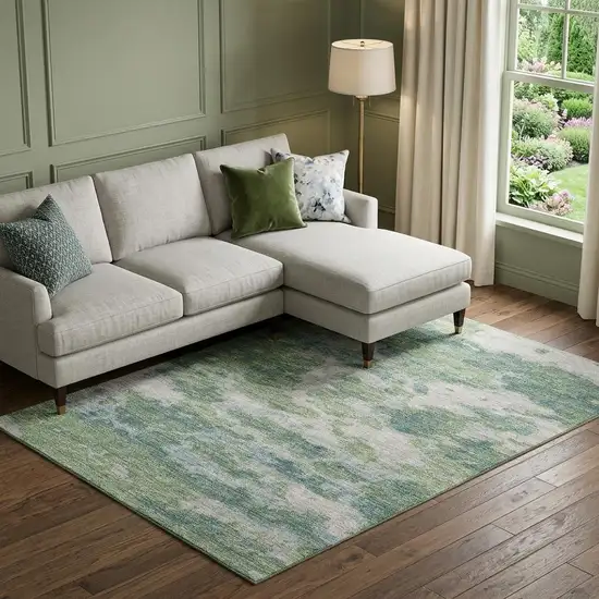 Green And Ivory Abstract Washable Area Rug With UV Protection Photo 1