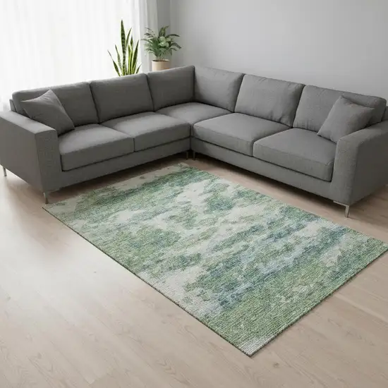Green And Ivory Abstract Washable Area Rug With UV Protection Photo 1