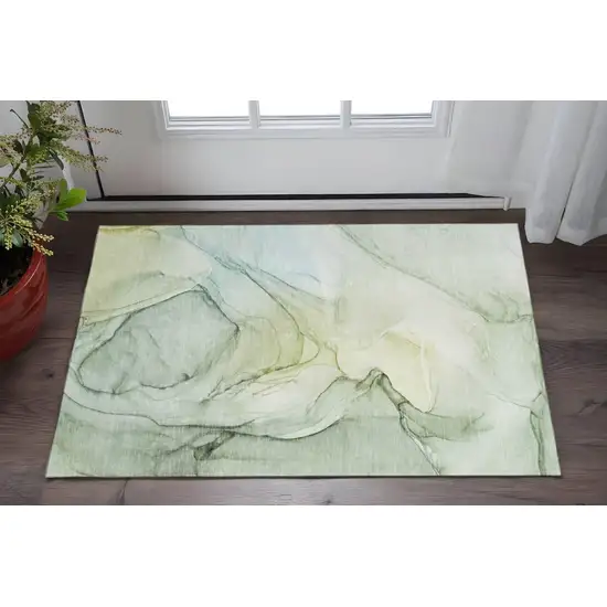Green And Ivory Abstract Washable Area Rug With UV Protection Photo 2
