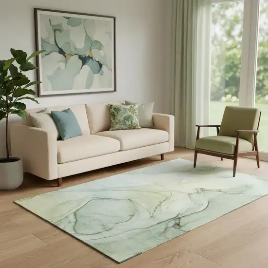 Green And Ivory Abstract Washable Area Rug With UV Protection Photo 1