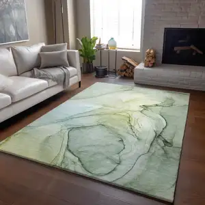 Photo of Green And Ivory Abstract Washable Area Rug With UV Protection