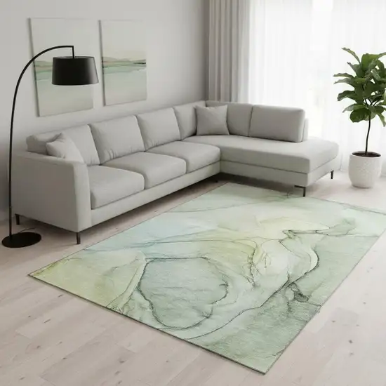 Green And Ivory Abstract Washable Area Rug With UV Protection Photo 1
