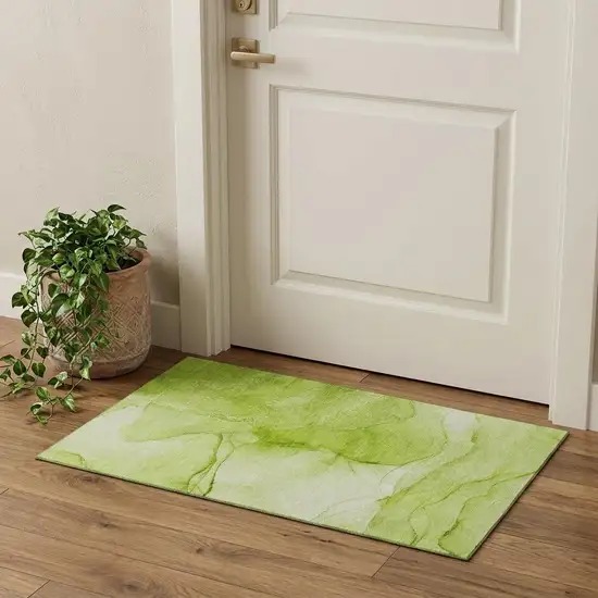 Green And Ivory Abstract Washable Area Rug With UV Protection Photo 1
