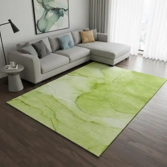 Green And Ivory Abstract Washable Area Rug With UV Protection Photo 1