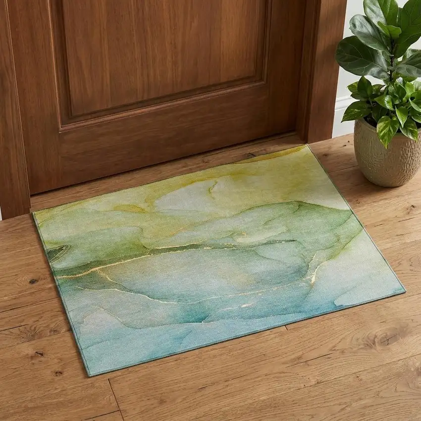 Green And Ivory Abstract Washable Area Rug With UV Protection Photo 1