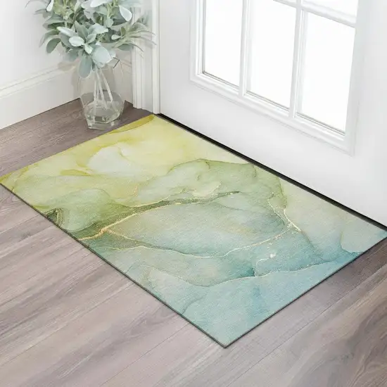 Green And Ivory Abstract Washable Area Rug With UV Protection Photo 1