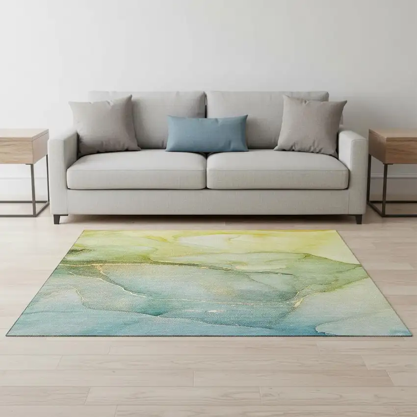 Green And Ivory Abstract Washable Area Rug With UV Protection Photo 1