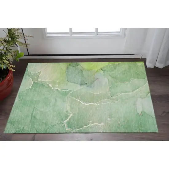 Green And Ivory Abstract Washable Area Rug With UV Protection Photo 2