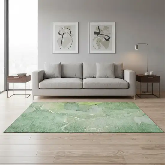 Green And Ivory Abstract Washable Area Rug With UV Protection Photo 1