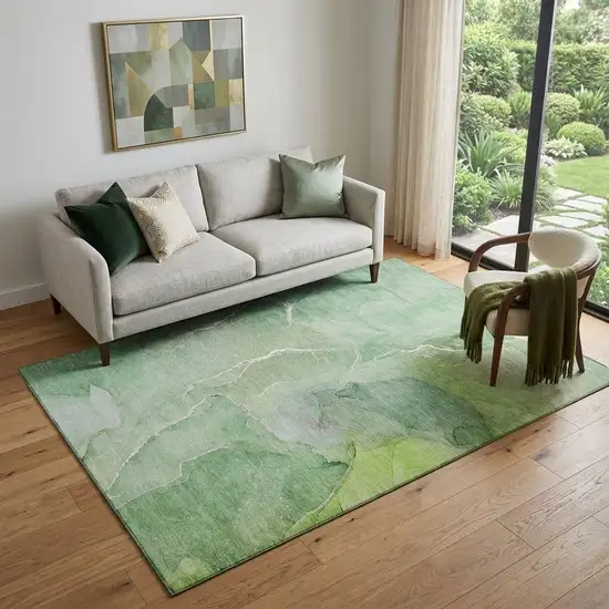 Green And Ivory Abstract Washable Area Rug With UV Protection Photo 1