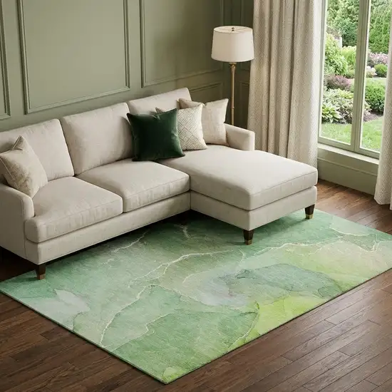 Green And Ivory Abstract Washable Area Rug With UV Protection Photo 1