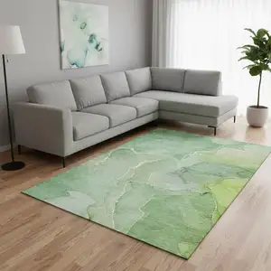 Photo of Green And Ivory Abstract Washable Area Rug With UV Protection