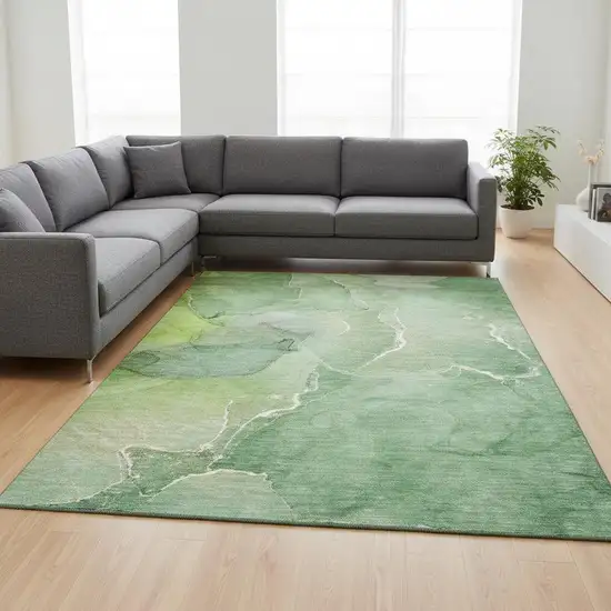 Green And Ivory Abstract Washable Area Rug With UV Protection Photo 1