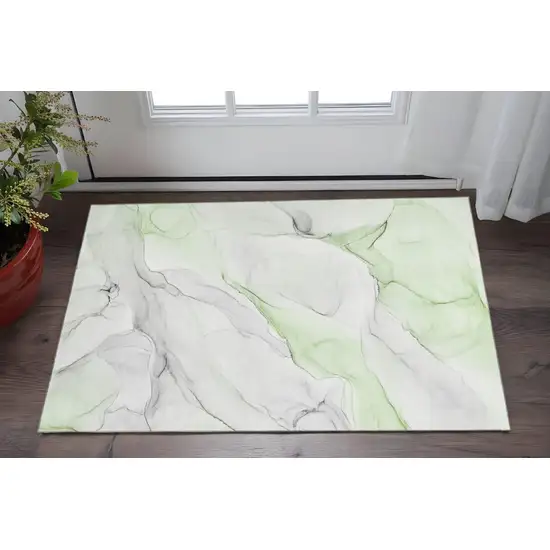 Green And Ivory Abstract Washable Area Rug With UV Protection Photo 2