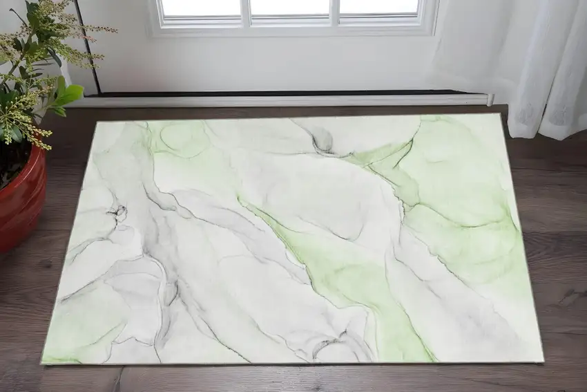 Green And Ivory Abstract Washable Area Rug With UV Protection Photo 2