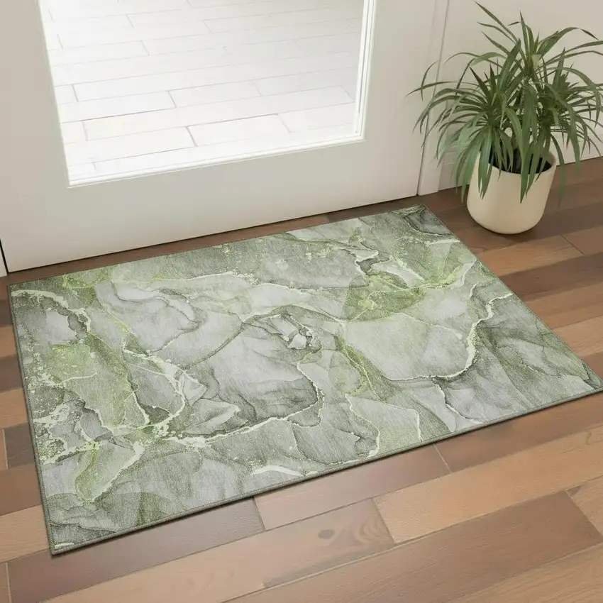 Green And Ivory Abstract Washable Area Rug With UV Protection Photo 1