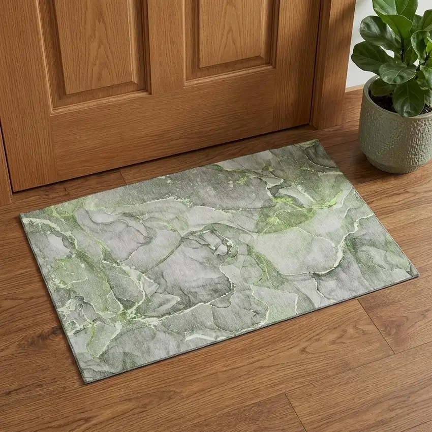 Green And Ivory Abstract Washable Area Rug With UV Protection Photo 1