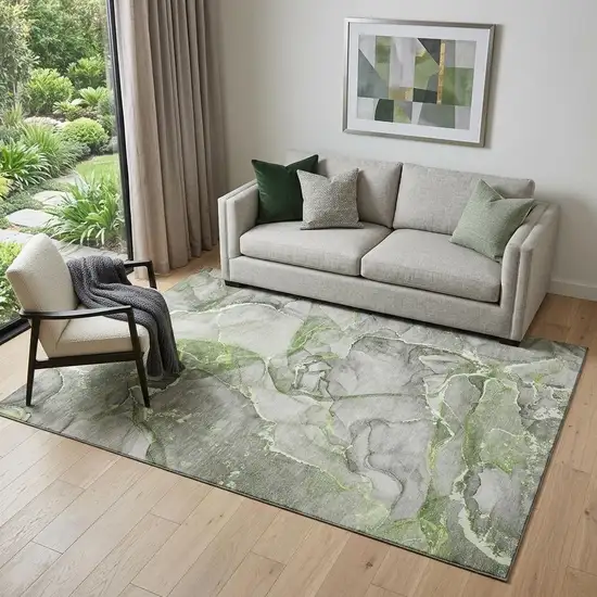 Green And Ivory Abstract Washable Area Rug With UV Protection Photo 1