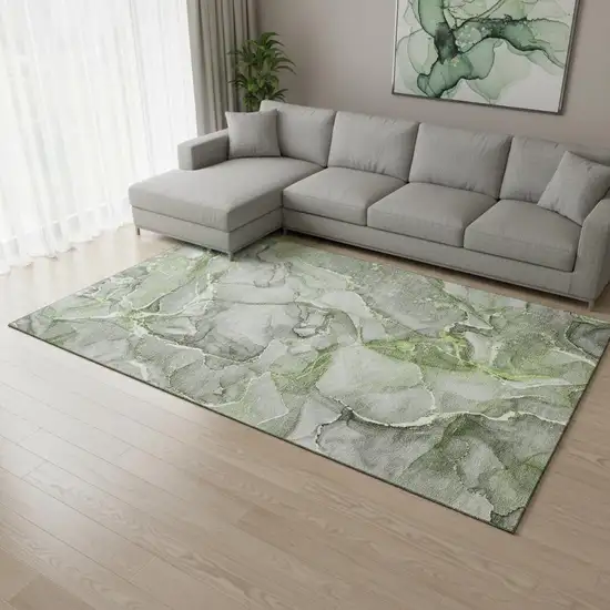 Green And Ivory Abstract Washable Area Rug With UV Protection Photo 1