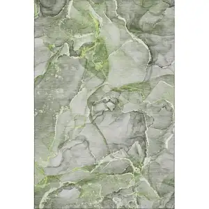 Photo of Green And Ivory Abstract Washable Area Rug With UV Protection
