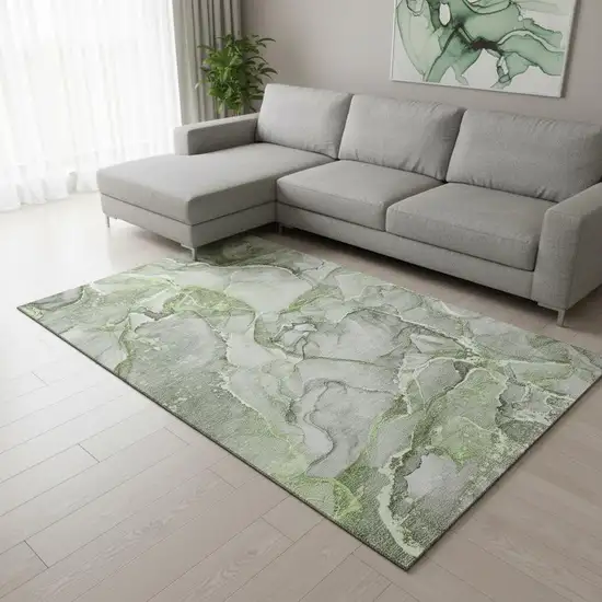 Green And Ivory Abstract Washable Area Rug With UV Protection Photo 1