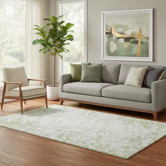 Green And Ivory Abstract Washable Area Rug With UV Protection Photo 1