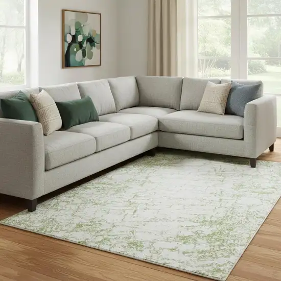 Green And Ivory Abstract Washable Area Rug With UV Protection Photo 1