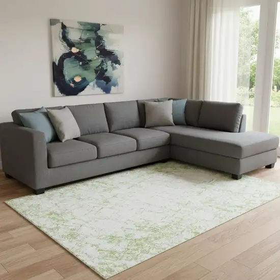 Green And Ivory Abstract Washable Area Rug With UV Protection Photo 1