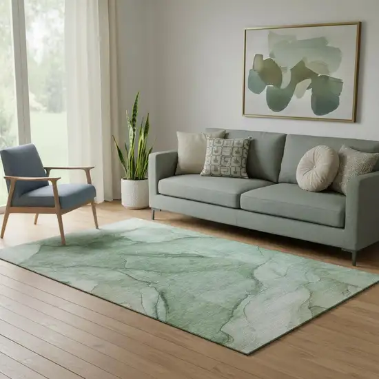 Green And Ivory Abstract Washable Area Rug With UV Protection Photo 1