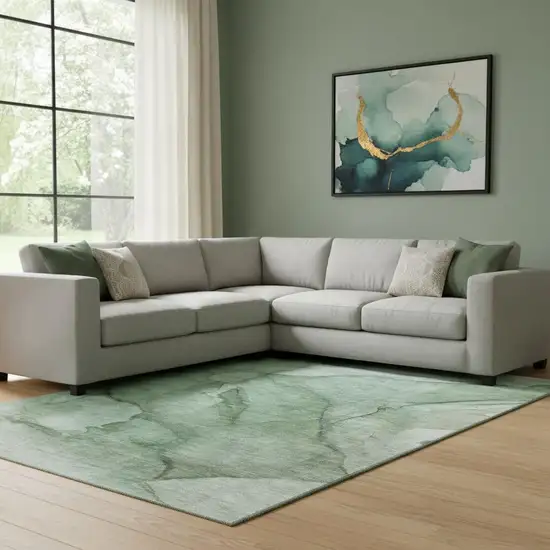 Green And Ivory Abstract Washable Area Rug With UV Protection Photo 1